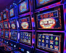 Filipino sports fan checking pub77 betting odds on a smartphone